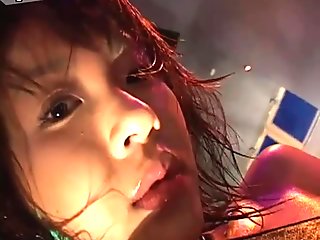 Pallid Asian nympho Harumi Nemoto shows her big boobs on camera